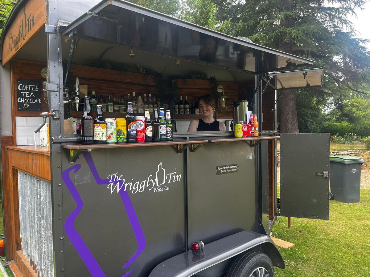 The Wriggly Tin horsebox bar set up outside a country house
